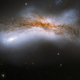 Illustration for article titled The Cosmic Wonder of Colliding Galaxies